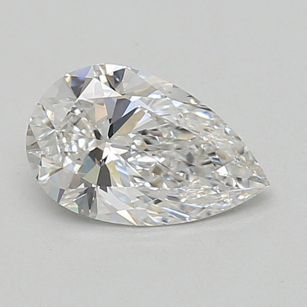 Pear-shaped lab-grown diamond with faceted surface reflecting light, displayed on neutral background.