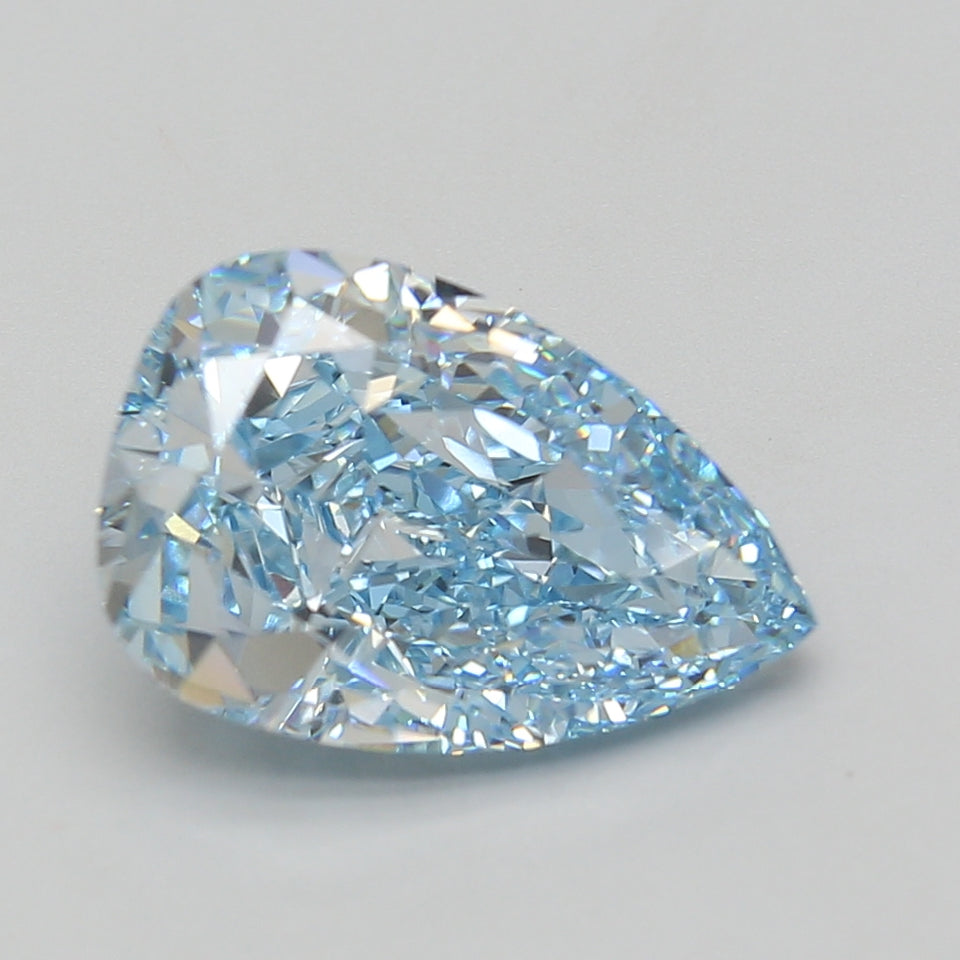 Pear-shaped colorless diamond with faceted surfaces displayed against a neutral gray background.