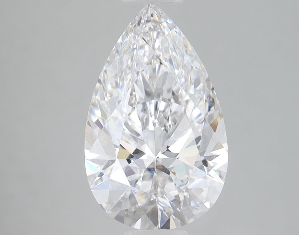 Pear-shaped lab-grown diamond with brilliant faceting and clear appearance on gray background.
