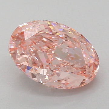 Oval-cut lab grown diamond with faceted surface reflecting light, displaying pale pink coloration against a neutral backgroun
