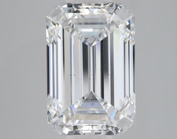 Emerald-cut lab-grown diamond with faceted surfaces and clear transparency on gray background.