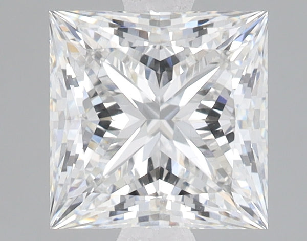 Princess cut lab-grown diamond with clear facets and light reflections displayed against a neutral gray background.