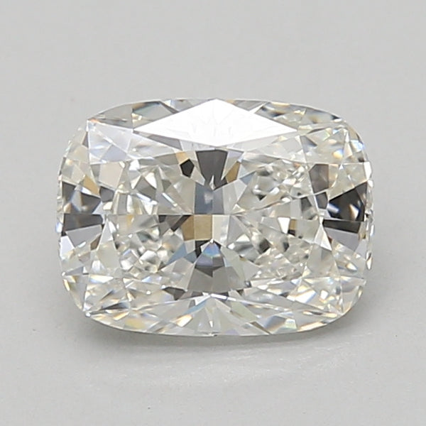 Cushion-cut lab-grown diamond with faceted surfaces reflecting light, displayed on neutral background.