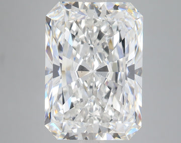 Clear radiant-cut diamond displaying faceted surfaces with light refraction on neutral background.