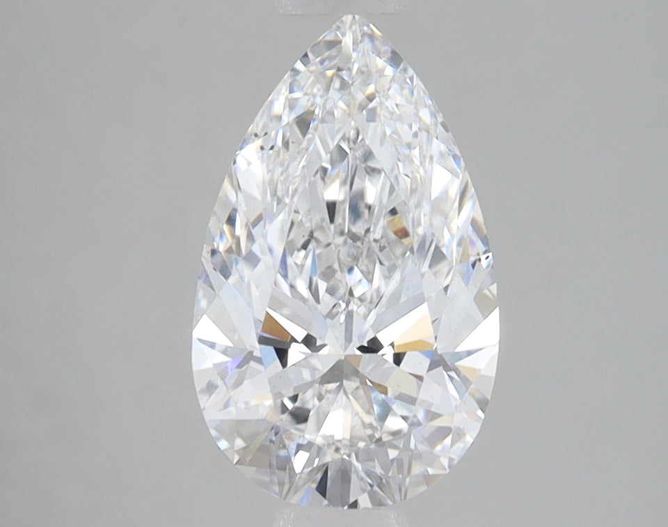 Pear-shaped clear diamond with faceted surfaces and light reflections on neutral background.