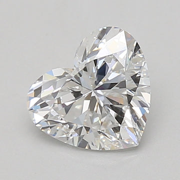 Heart-shaped lab-grown diamond with faceted surface and light reflections on neutral background.