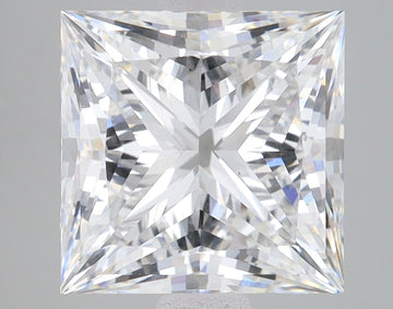 Princess-cut lab-grown diamond with faceted surface showing light refraction patterns against gray background.