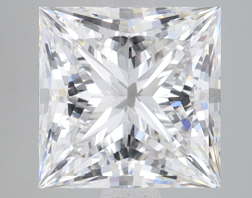 Princess-cut lab-grown diamond with faceted surface showing light refraction patterns against gray background.