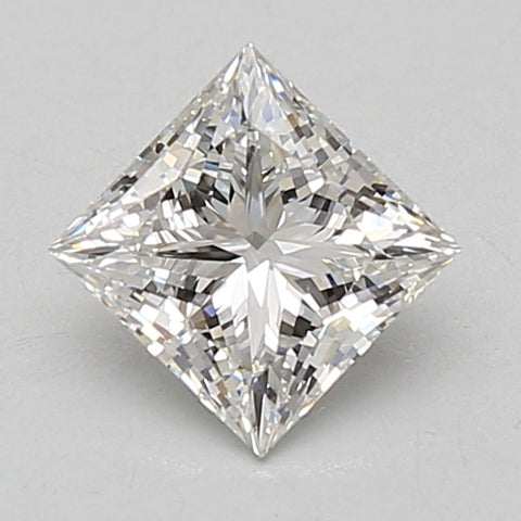 Princess cut lab-grown diamond with faceted surfaces reflecting light, displayed at an angle against a neutral background.