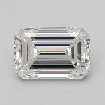 Emerald-cut lab-grown diamond with clear faceting and light reflections on neutral background.