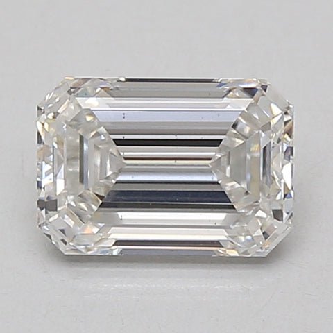 Emerald-cut lab-grown diamond loose stone with faceted surfaces and light reflections on neutral background.