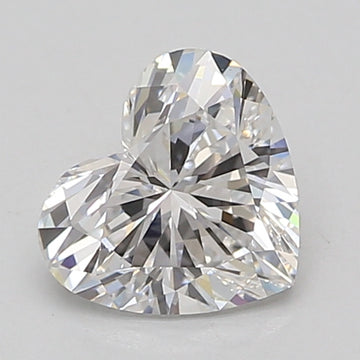 Heart-shaped lab-grown diamond loose stone with faceted surface and light reflections on neutral background.