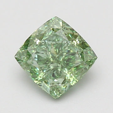 Cushion-cut lab-grown diamond with light green tint and faceted surface, displayed against neutral background.