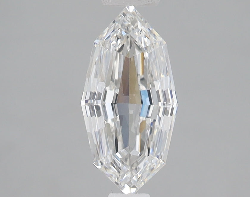 Clear lab-grown diamond with step-cut faceting, elongated oval shape, displaying light refraction on gray background.
