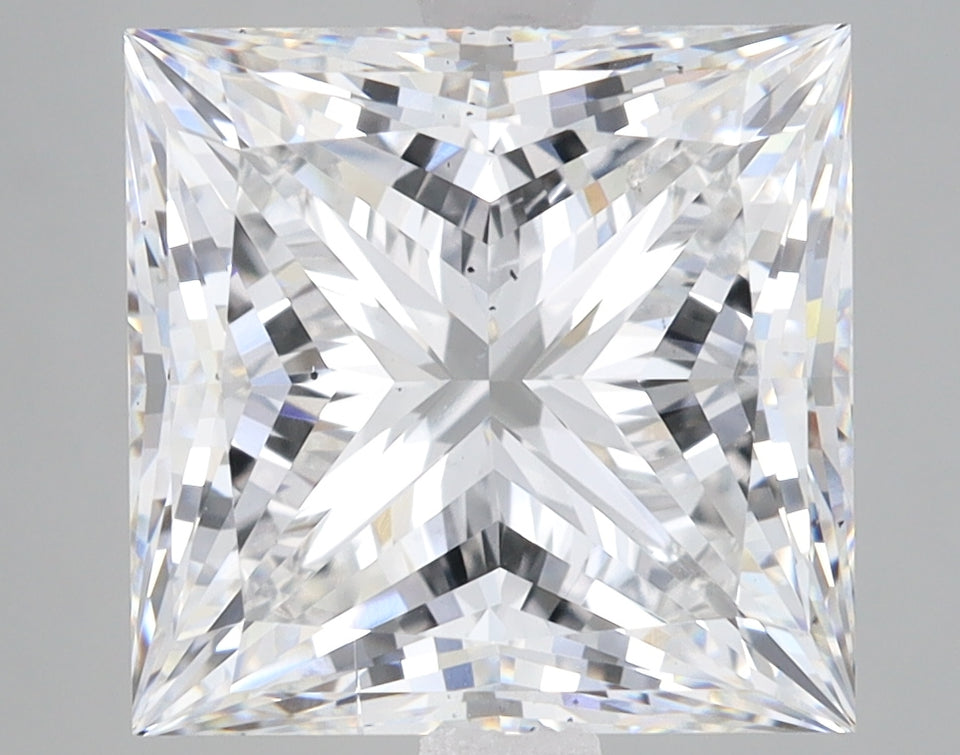 Princess cut lab grown diamond with faceted surface reflecting light, displaying clear colorless appearance.