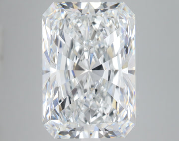 Clear radiant-cut lab-grown diamond with faceted surfaces reflecting light, displayed against neutral background.