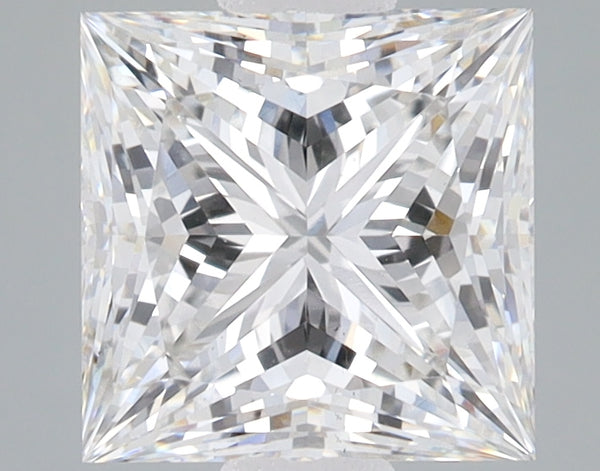 Princess cut lab grown diamond with faceted surfaces reflecting light, displayed against neutral background.
