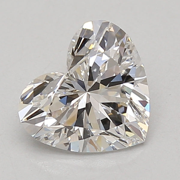 Heart-shaped lab-grown diamond with faceted surfaces and light reflections, certification number 2021689.