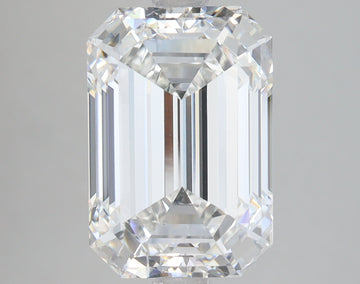 Emerald-cut lab-grown diamond with faceted surfaces and clear transparency, displayed against neutral background.