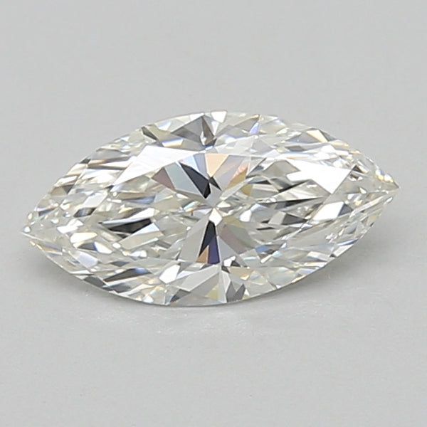 Marquise-cut diamond with faceted surface and light yellow tint, displayed against gray background.