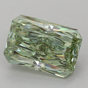 Radiant cut lab-grown diamond with light yellow-green tint, faceted surface reflecting light, displayed on neutral background