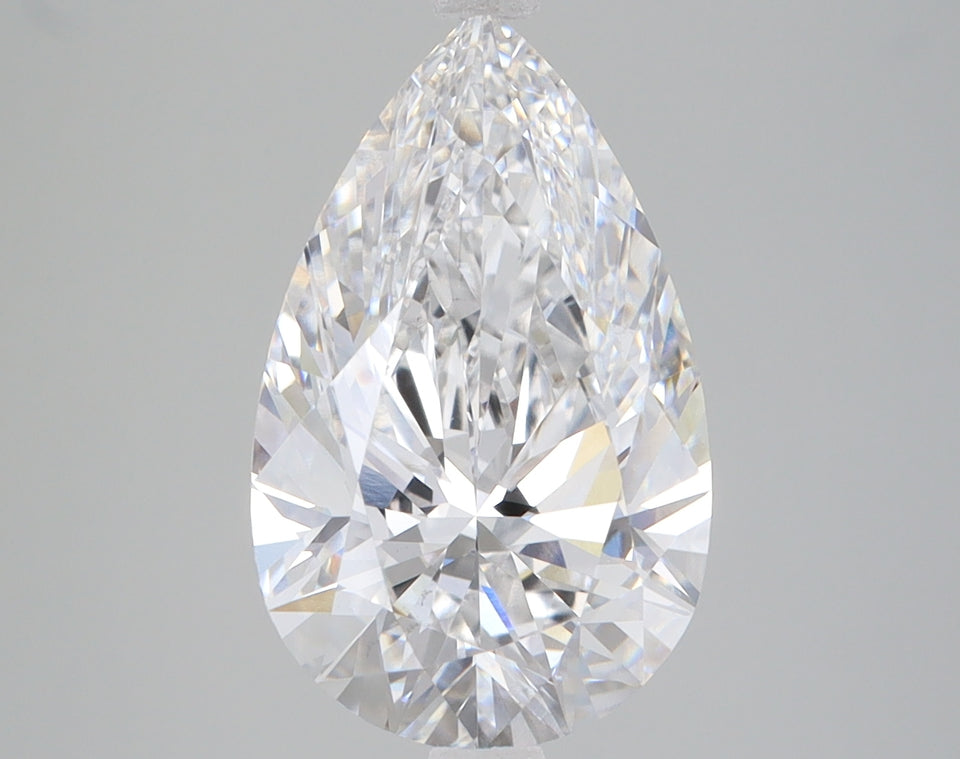 Pear-shaped lab-grown diamond with faceted surfaces and clear coloring on neutral background.