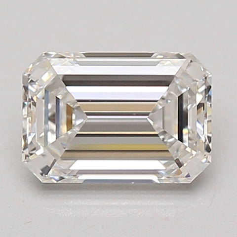 Emerald-cut lab-grown diamond with faceted surfaces and clear transparency, displayed against a neutral background.