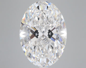 Oval-cut lab-grown diamond with faceted surfaces reflecting light, displayed against a neutral background.