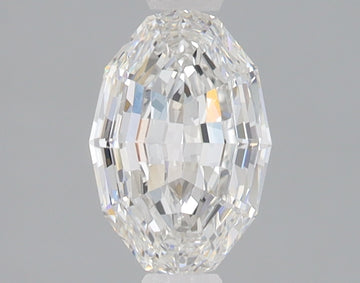 Oval step-cut lab-grown diamond with geometric faceted surface and light refraction, displayed against gray background.