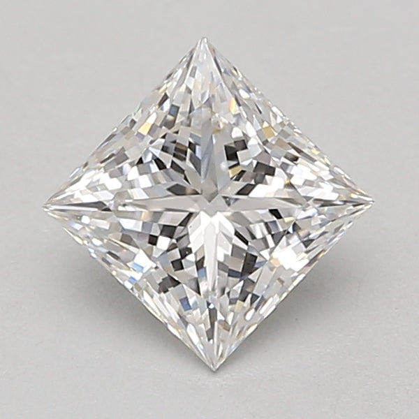 Princess-cut lab-grown diamond with faceted surfaces and light refraction, displayed against neutral background.