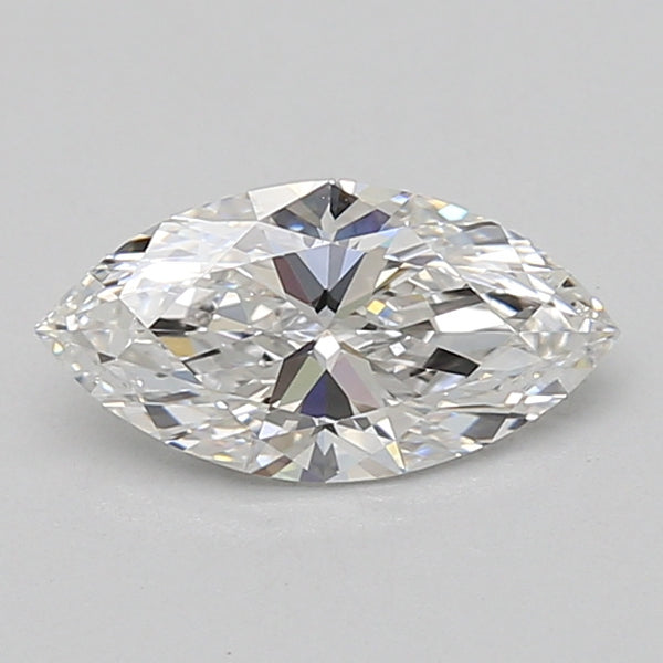 Marquise cut loose diamond with faceted surfaces and clear crystalline appearance on gray background.