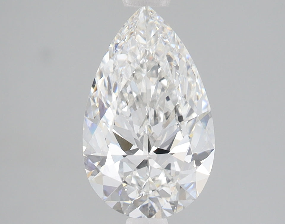 Pear-shaped colorless diamond with faceted surfaces and light reflections on gray background.