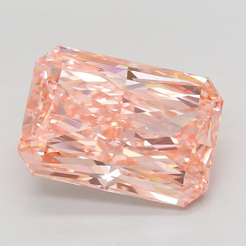 Radiant cut lab-grown diamond with peachy-pink hue and faceted surface reflecting light.