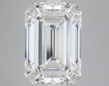 Emerald-cut lab-grown diamond with faceted surfaces and clear transparency, displaying light refraction with subtle color ton