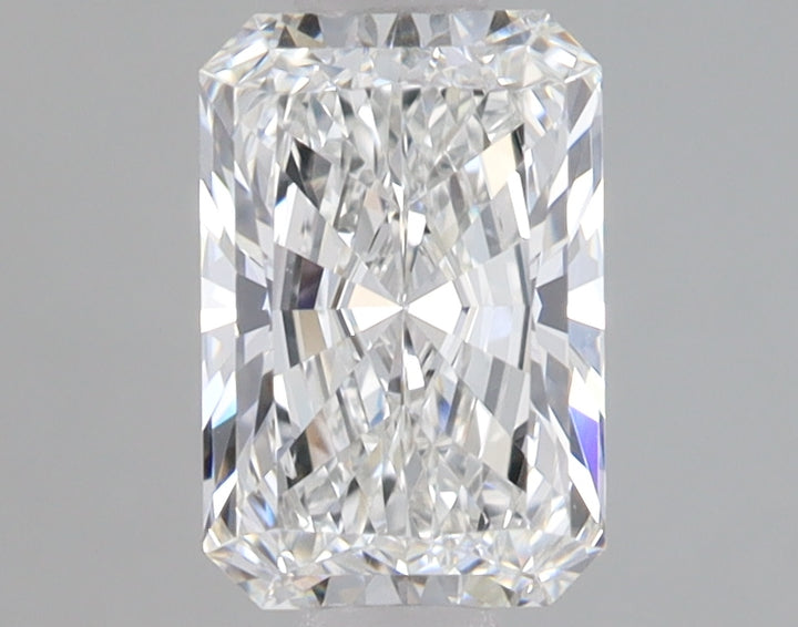 Radiant cut lab-grown diamond with faceted surfaces reflecting light, displayed against neutral background.