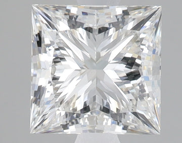 Princess-cut lab grown diamond with faceted surfaces reflecting light, displayed on neutral background.