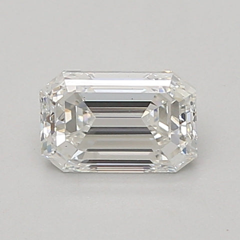 Emerald cut lab grown diamond, 0.8 carat, colorless with faceted surfaces and step-cut pattern.