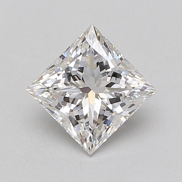 Princess-cut loose diamond with faceted surfaces reflecting light, displayed against a neutral background.