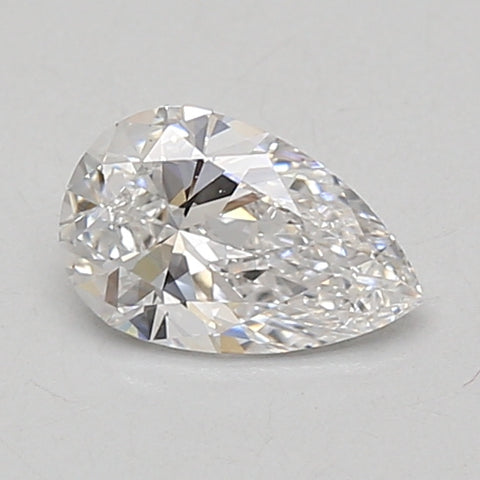 Pear-shaped colorless lab-grown diamond with faceted surface on neutral background.