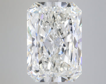 Radiant cut lab grown diamond with faceted surfaces reflecting light, displayed against a neutral gray background.