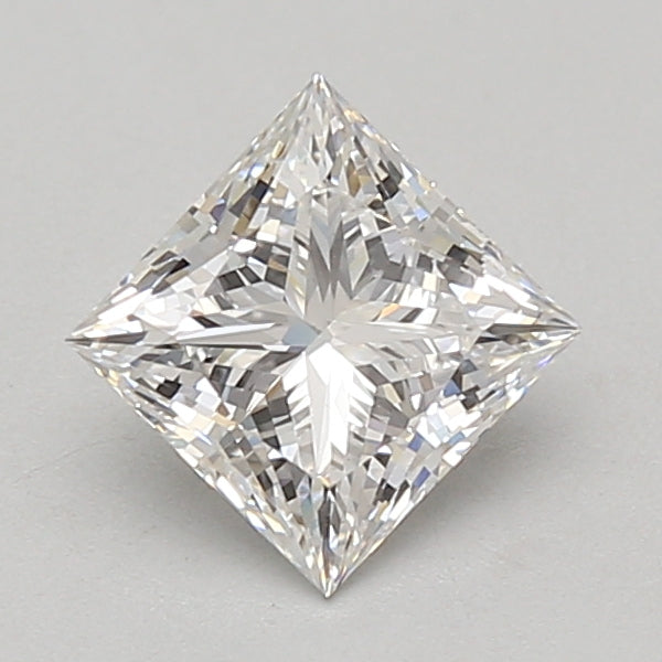 Princess cut lab grown diamond with brilliant faceting and light reflection on neutral background.