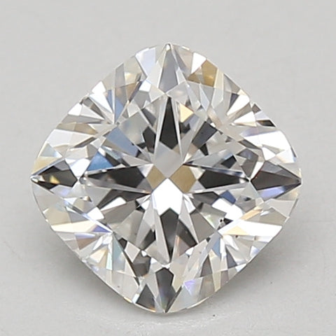 Cushion-cut loose diamond with faceted surface displaying light refraction and sparkle against a neutral background.