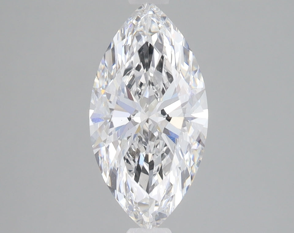 Clear marquise-cut lab-grown diamond with brilliant faceting and light refraction on neutral background.