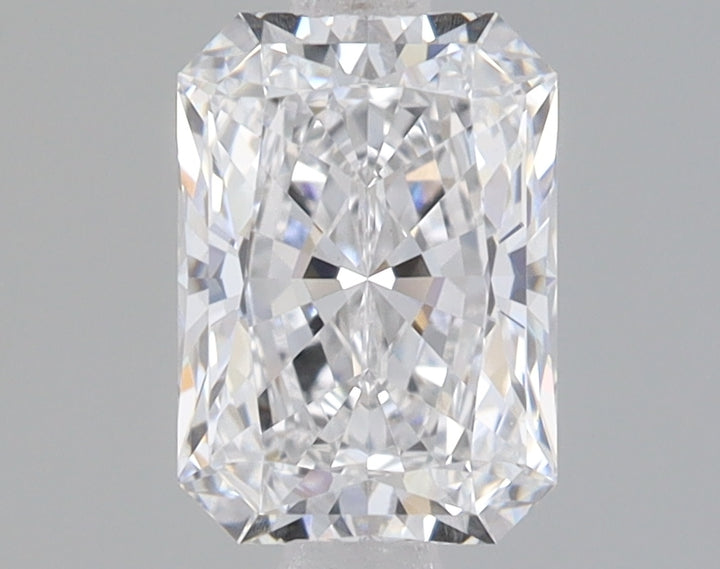 Radiant cut lab-grown diamond with faceted surface displaying light refraction and sparkle against neutral background.