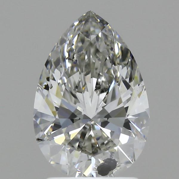Pear-shaped lab-grown diamond with faceted surface and light reflections on neutral background.