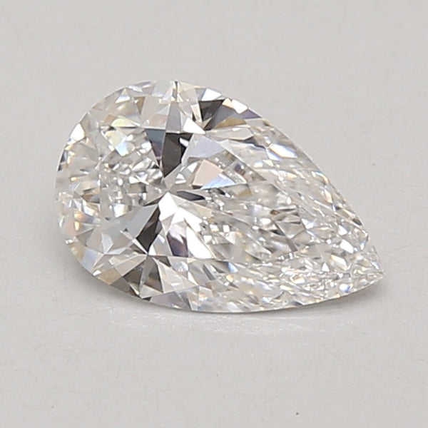 Pear-shaped lab-grown diamond with faceted surface and light coloration on neutral background.