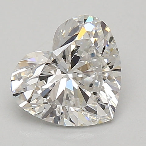 Heart-shaped lab-grown diamond with faceted surfaces reflecting light, approximately 1.42 carats.