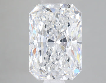 Radiant cut lab-grown diamond with clear faceted surface and light reflections on neutral background.