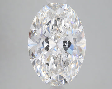 Oval-cut loose diamond with faceted surfaces reflecting light, displayed against a neutral gray background.
