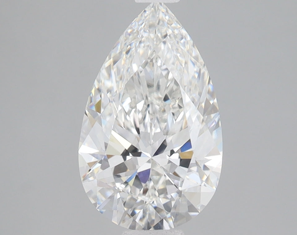 Pear-shaped lab grown diamond with faceted surface and clear coloring against gray background.